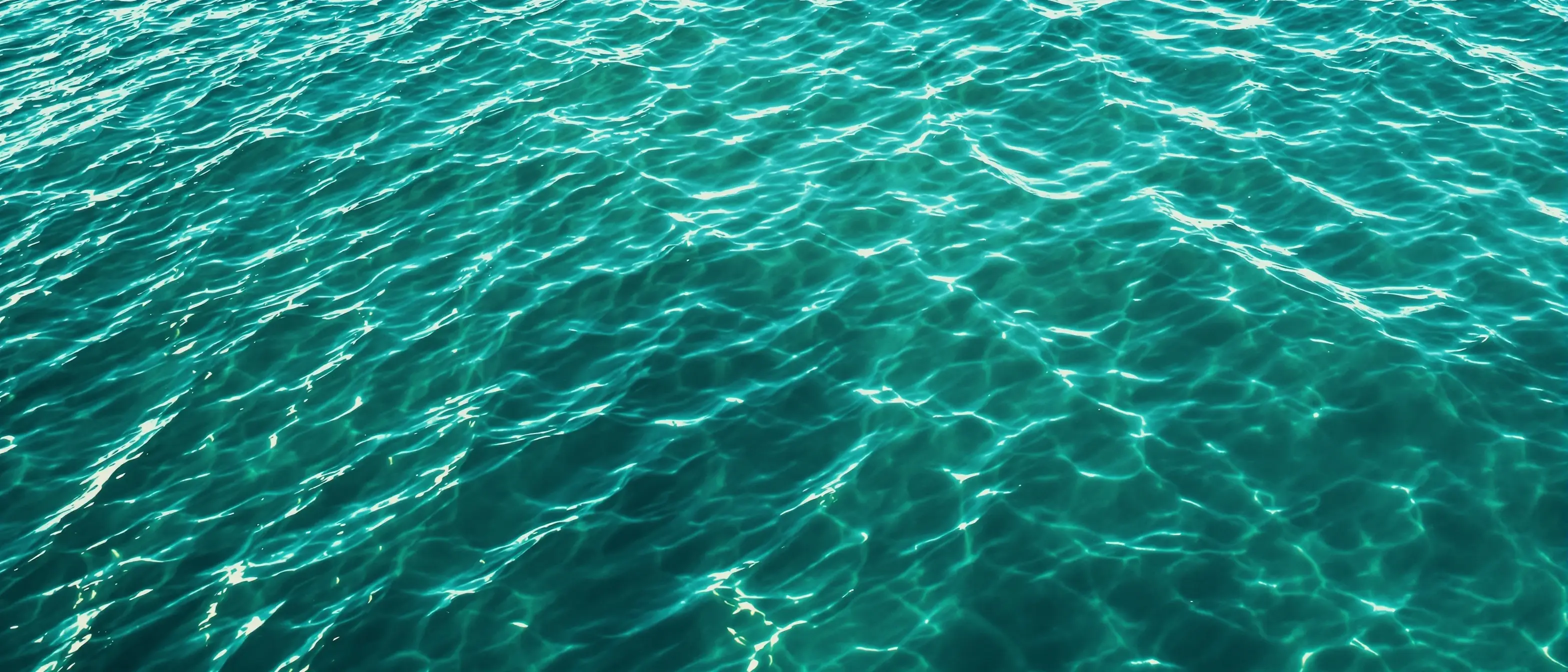Calm teal Florida Gulf ocean water at sunset — Open Water Rx GLP-1 weight loss telehealth background