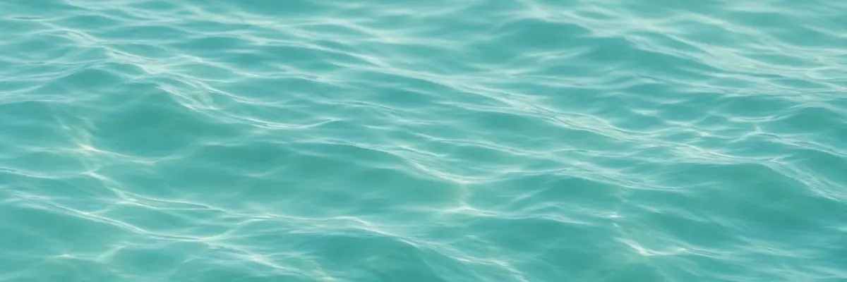Calm teal ocean texture background